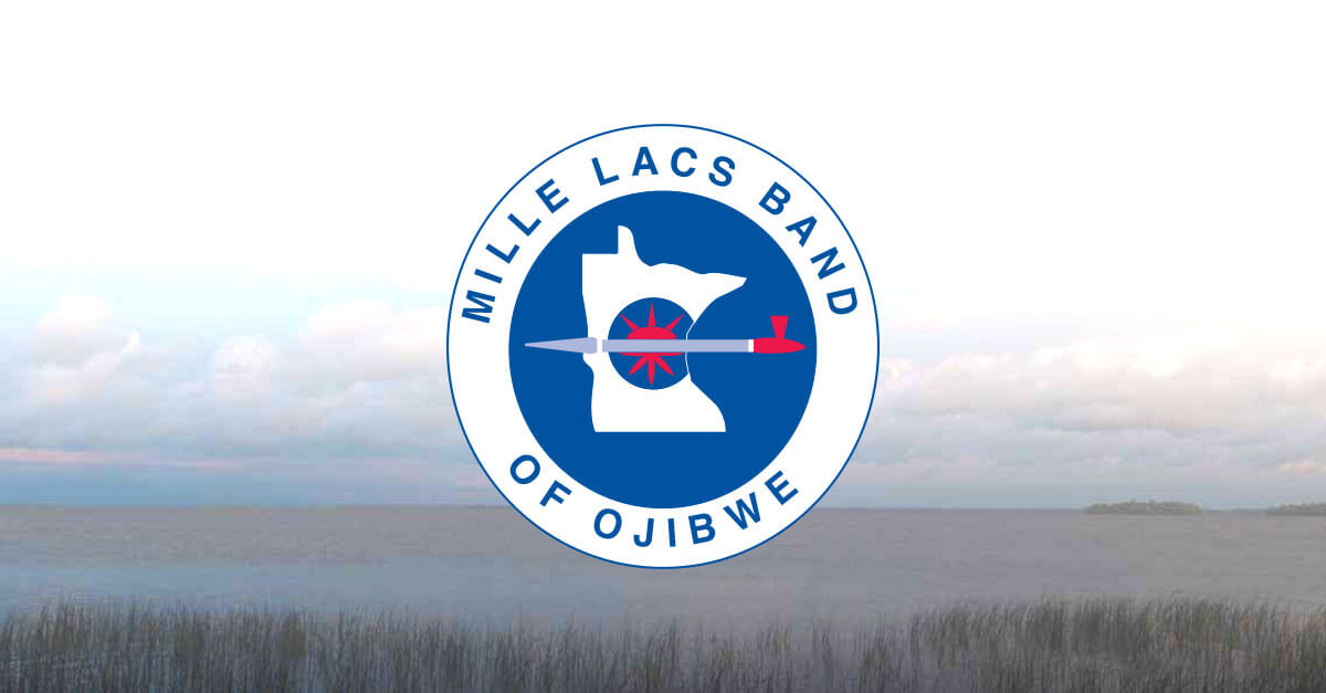 Mille Lacs Band of Ojibwe logo over lake view.
